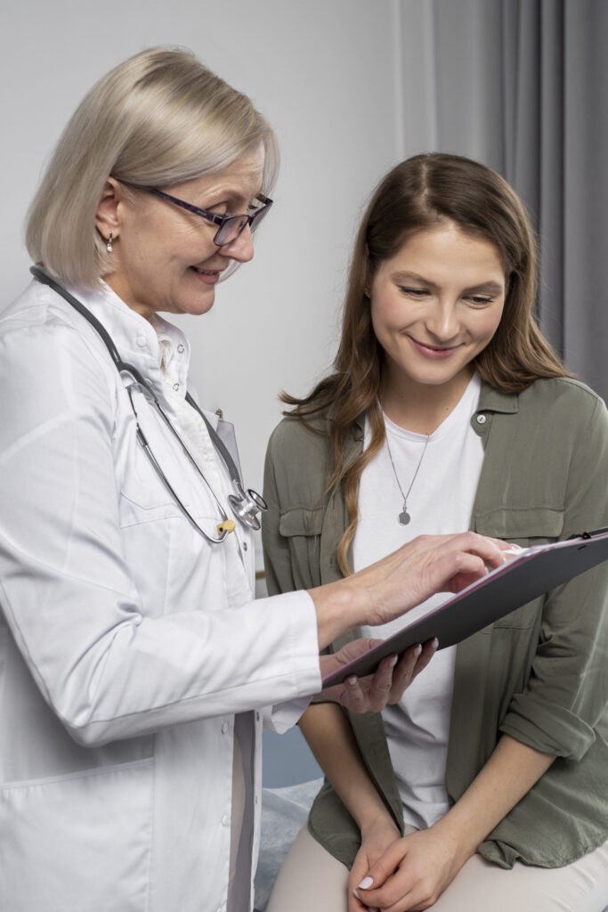 Doctor checking a patient and discussing fertility options after myomectomy at Eva WomanCare, Vashi